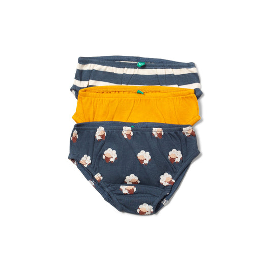 Three pairs of children's underwear in different colors on a white background