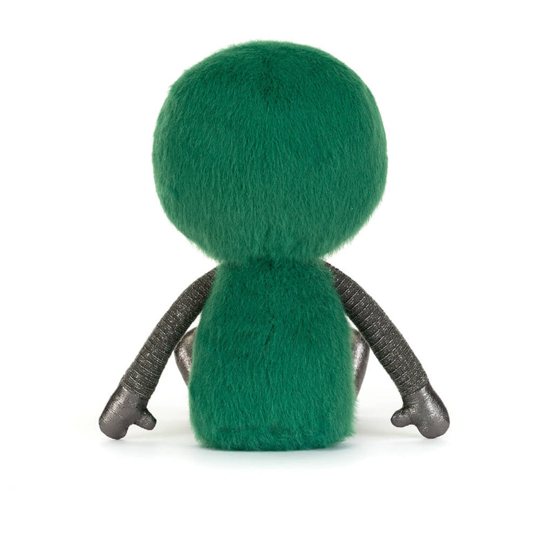 Green plush toy with gray limbs on a white background