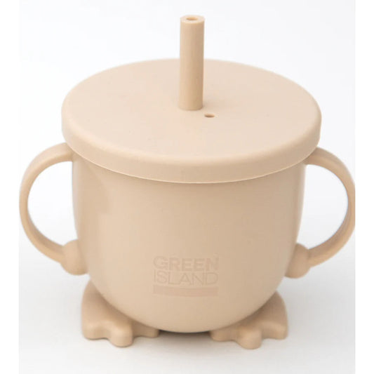 Beige sippy cup with a straw lid on a white background