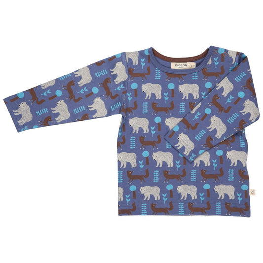 Folded children's shirt with bear pattern on a white background