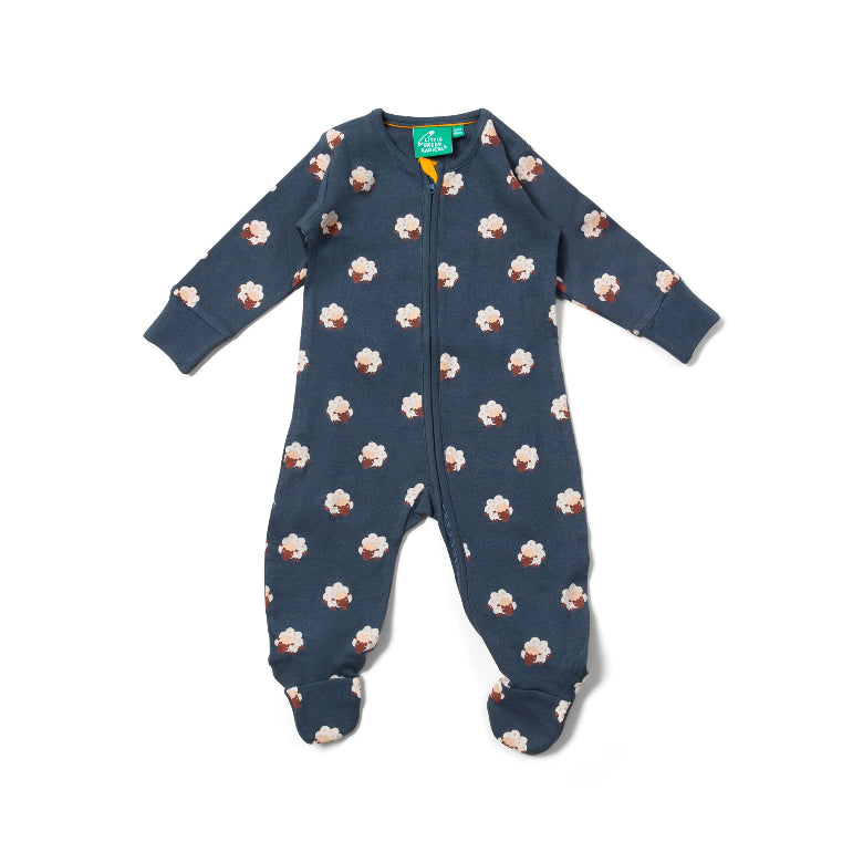 Blue baby onesie with cupcake pattern on a white background