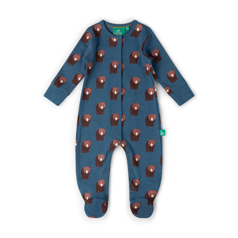 A baby footed sleeper in slate blue with a repeating brown bear print, shown flat on a white background.