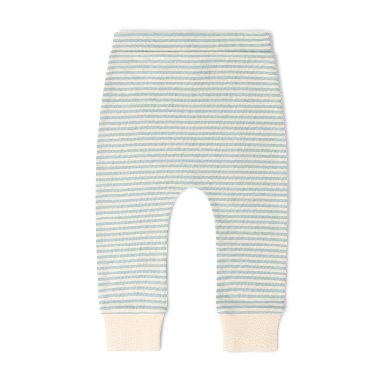 A pair of baby pants with a light blue and white horizontal stripe pattern, featuring solid cream-colored ribbed cuffs at the ankles.