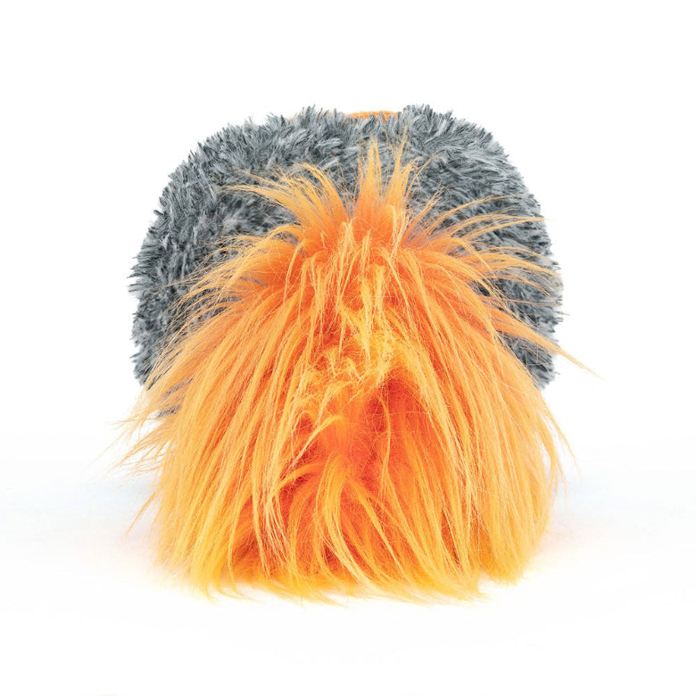 Gray and orange plush toy on a white background