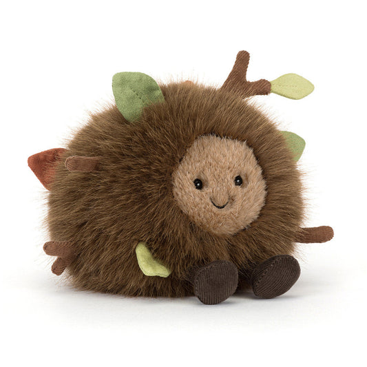 Plush toy hedgehog with a smiling face on a white background