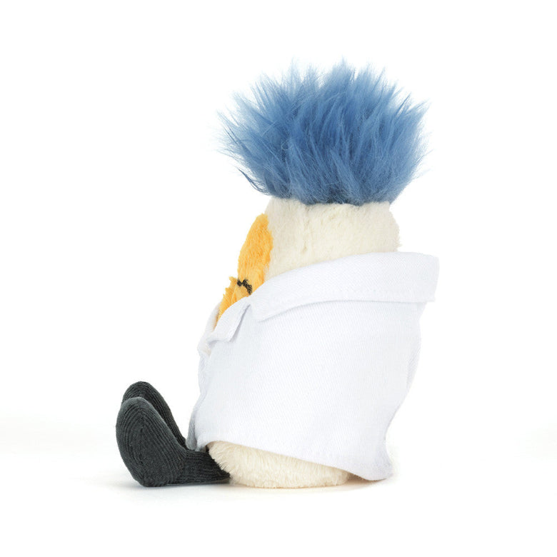 Plush toy resembling a character with blue hair and a white outfit on a white background