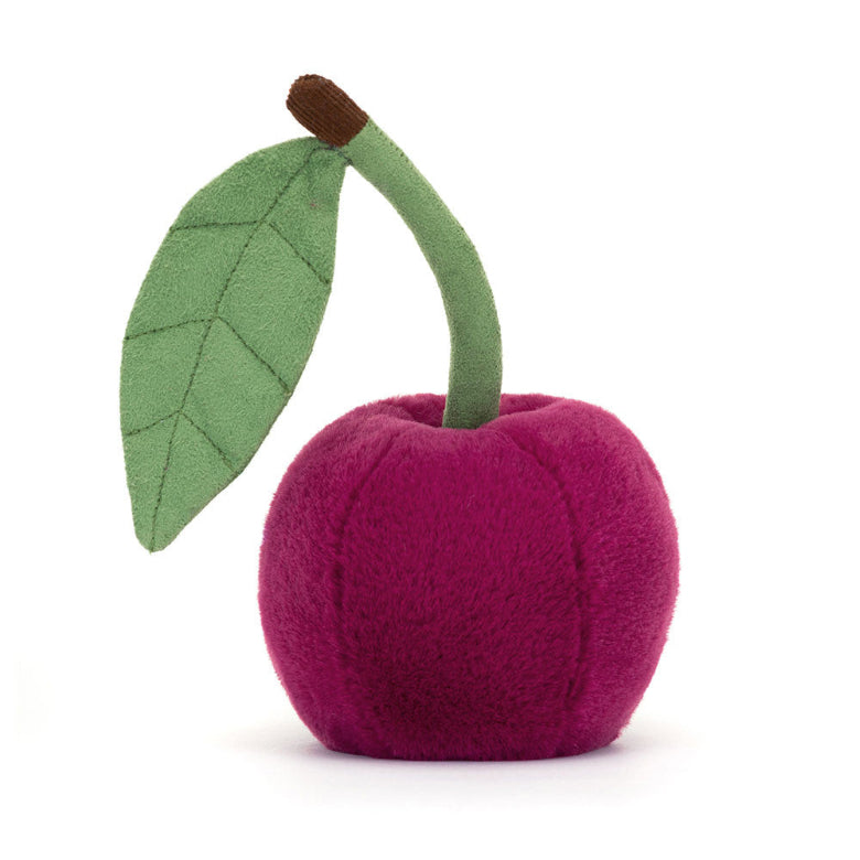 Purple plush cherry with a green stem and leaf on a white background