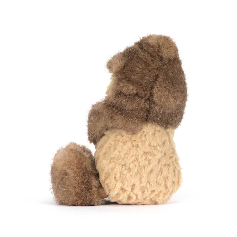 Stuffed animal bear with brown fur and beige knitted bottom on a white background