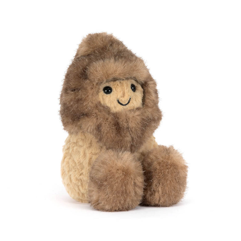 Plush toy sloth with a smiling face on a white background