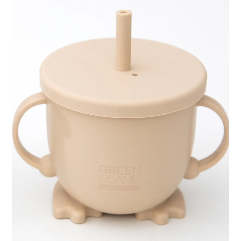 Beige sippy cup with a straw lid on a white background