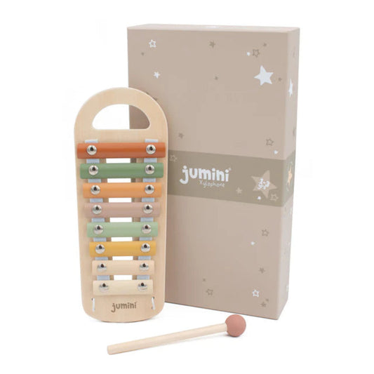 Wooden xylophone toy with colorful bars and a wooden mallet, next to its packaging box featuring the 'jumini' brand.