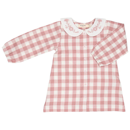 A pink and white gingham long-sleeve button-up shirt for toddlers, featuring a white Peter Pan collar with pink floral embroidery.