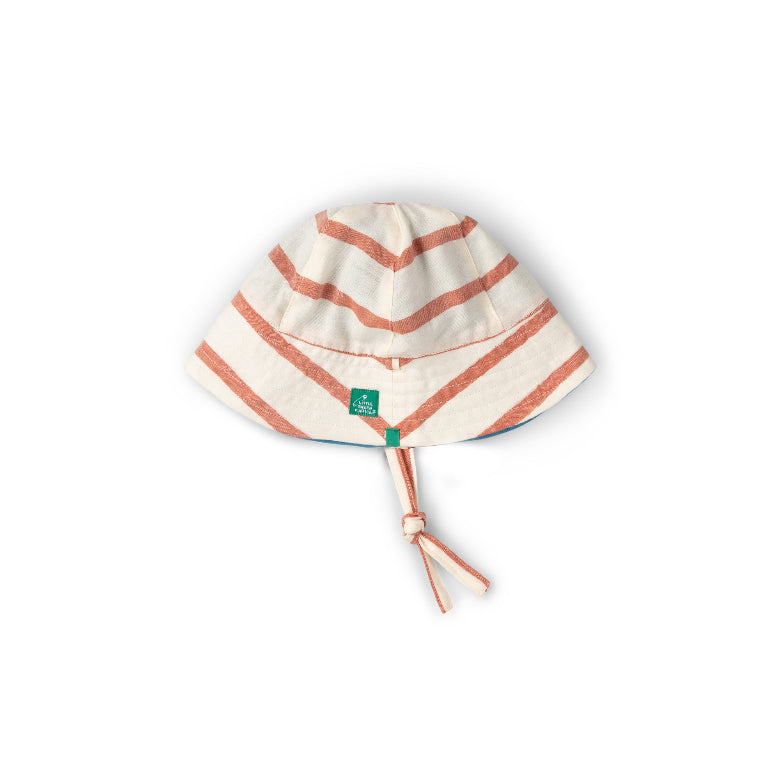 Striped baby hat with a green tag on a white background