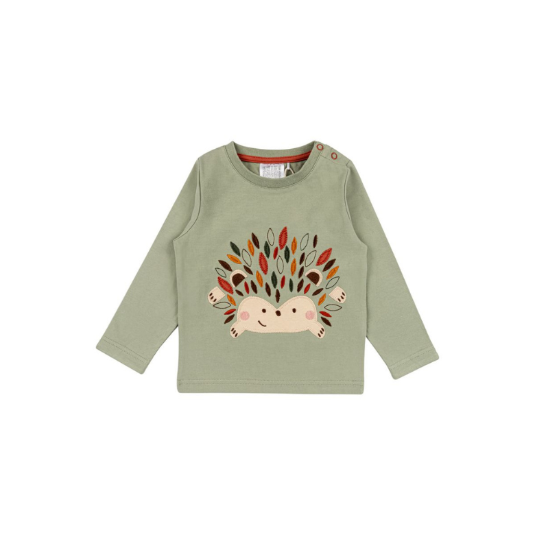 A light sage green long-sleeve baby t-shirt with a cute embroidered hedgehog design on the front, featuring a cream-colored face and spines decorated with colorful autumn leaves.
