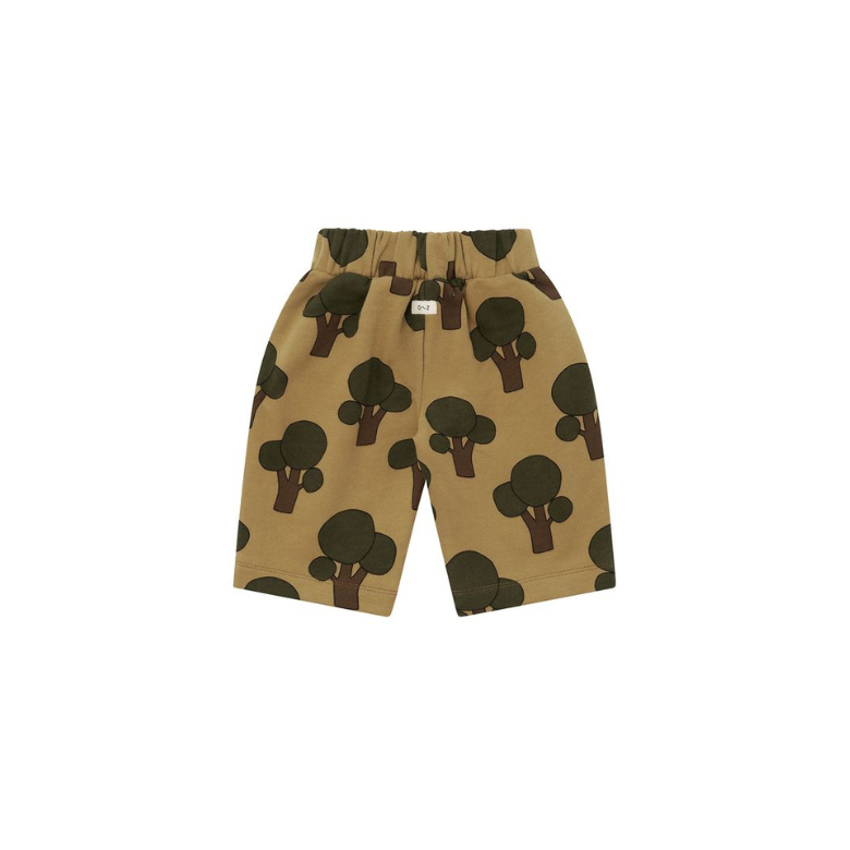 A pair of toddler shorts in a tan color with a dark green and brown tree print, shown flat against a white background.