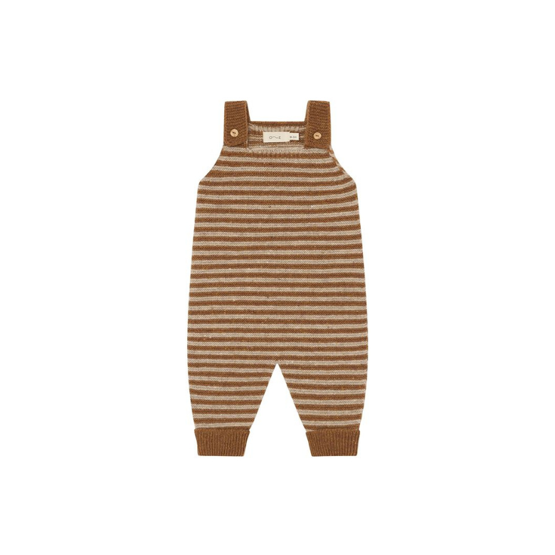 A baby knit overall romper with horizontal brown and beige stripes, featuring adjustable shoulder straps with snap buttons, photographed on a solid white background.