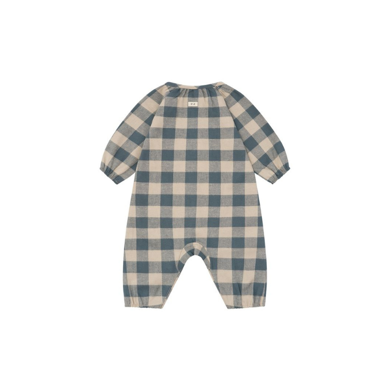 A baby long-sleeve footless one-piece jumpsuit in a muted blue and beige gingham check pattern, shown flat against a solid white background.