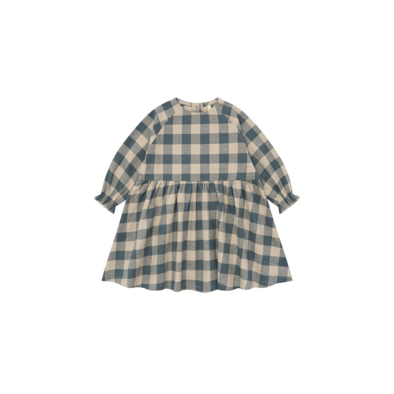 A long-sleeve children's dress with a blue and beige gingham check pattern, featuring a gathered waist and ruffled cuffs, shown against a plain white background.