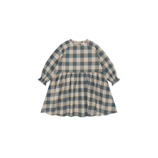 A long-sleeve children's dress with a blue and beige gingham check pattern, featuring a gathered waist and ruffled cuffs, shown against a plain white background.