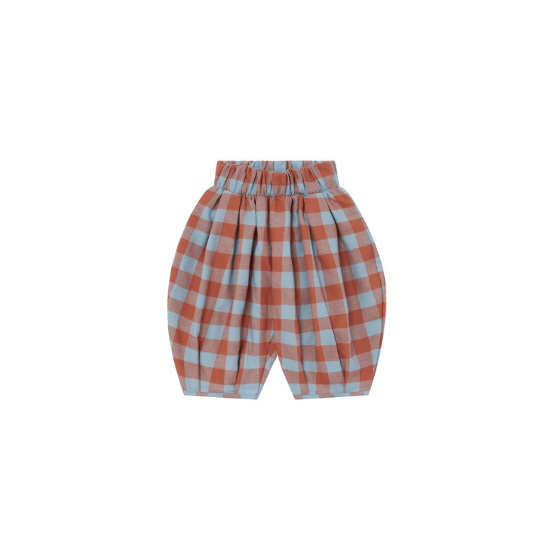A pair of children's pleated shorts in a terracotta orange and light blue gingham check pattern, displayed against a solid white background.