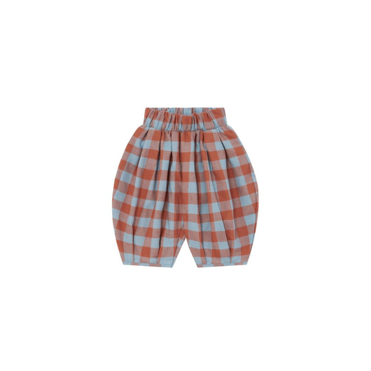 A pair of children's pleated shorts in a terracotta orange and light blue gingham check pattern, displayed against a solid white background.