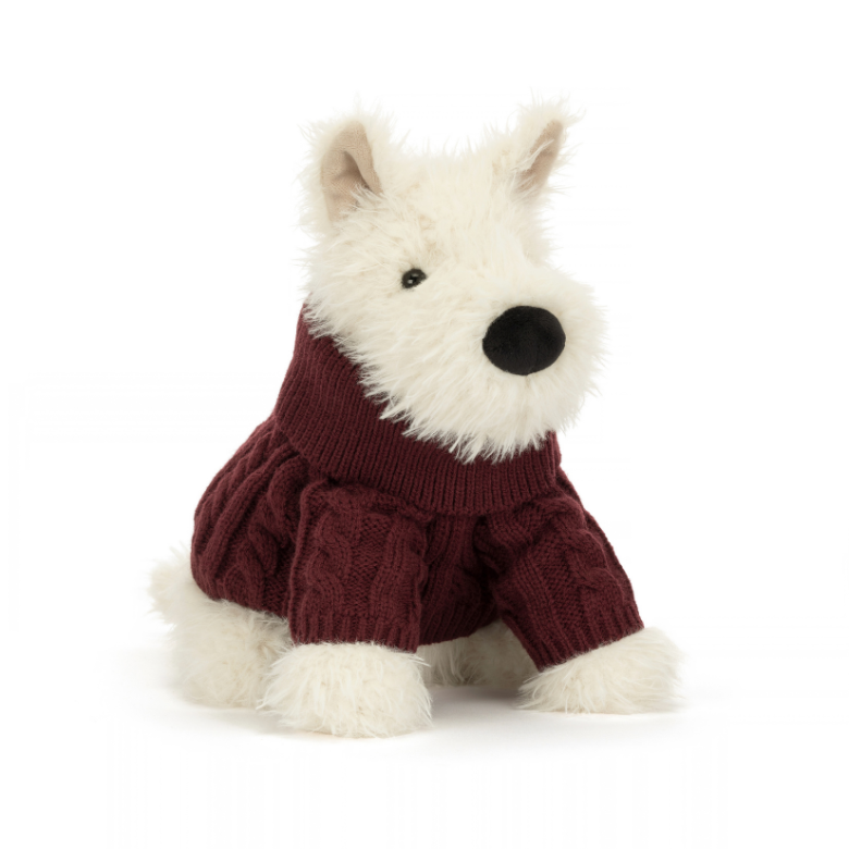 A small white plush dog wearing a burgundy knit sweater, photographed against a clean white background.