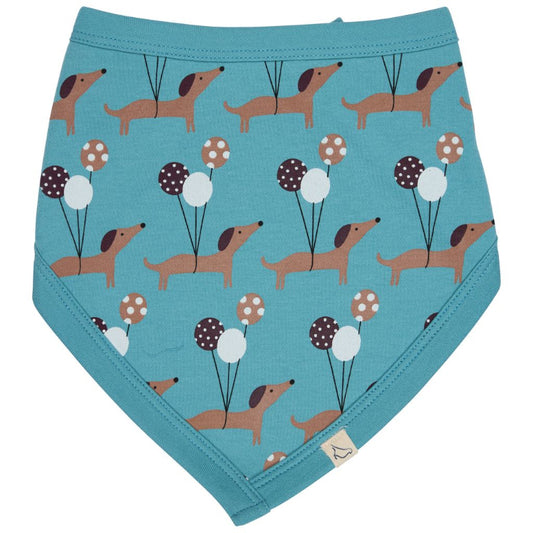 A baby bandana diaper cover in a teal blue color, featuring an all-over print of brown dachshunds holding brown, white, and dark brown polka-dot balloons. The product is laid flat on a clean white background.