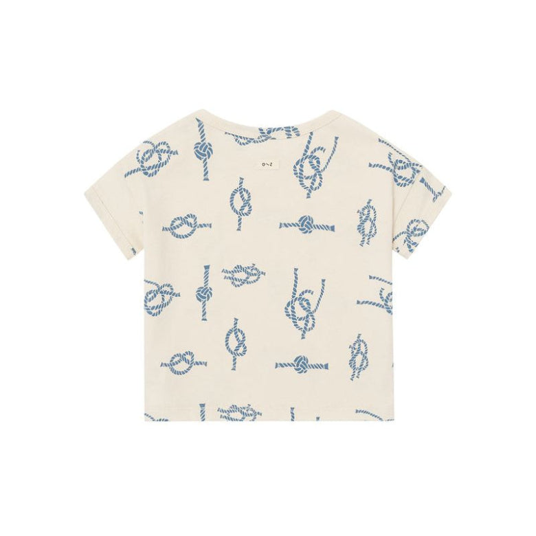 Beige t-shirt with blue knot pattern on a white background