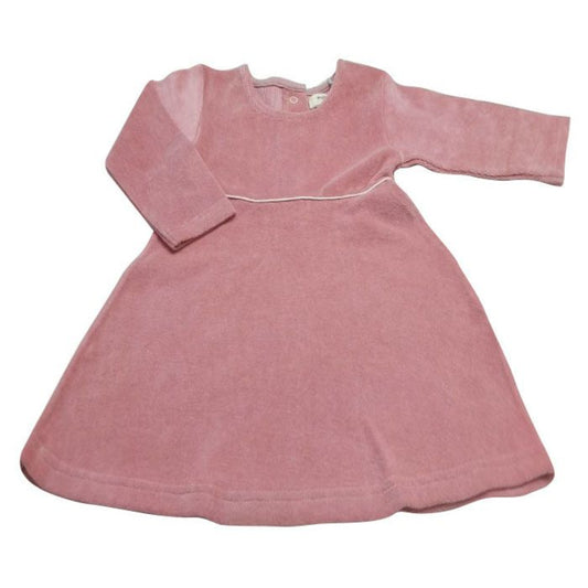A dusty pink long-sleeve dress made of a textured corduroy or velour fabric, featuring a round neckline and a flared skirt, laid flat against a white background.
